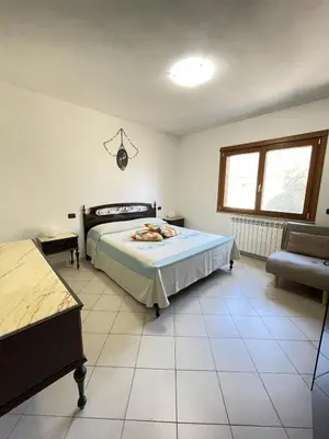 Letto o letti in una camera di A Casa di Anita - Appartamento in Ogliastra a 5 minuti dalla spiaggia