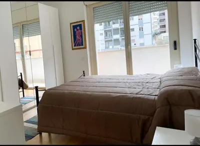 Letto o letti in una camera di Le Tre Moire Cagliari
