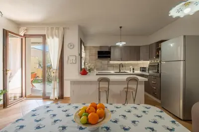 Cucina o angolo cottura di Boutique Home- Modernità & Tradizione Sarda-5 minuti da spiagge e centro