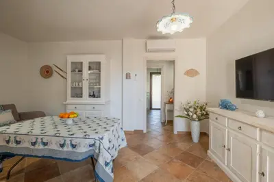 Letto o letti in una camera di Boutique Home- Modernità & Tradizione Sarda-5 minuti da spiagge e centro