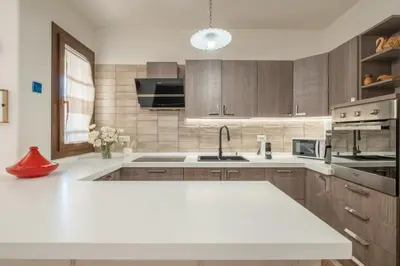 Cucina o angolo cottura di Boutique Home- Modernità & Tradizione Sarda-5 minuti da spiagge e centro