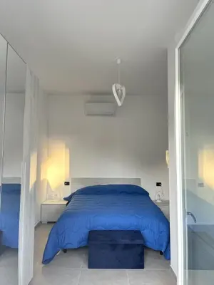 Letto o letti in una camera di Lera's apartments, bilocale luminoso e confortevole