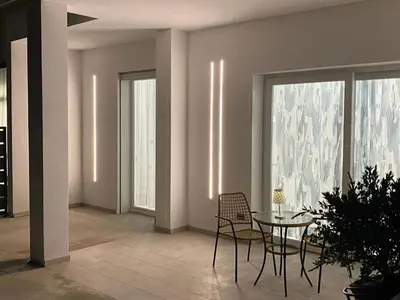 Area soggiorno di Lera's apartments, bilocale luminoso e confortevole