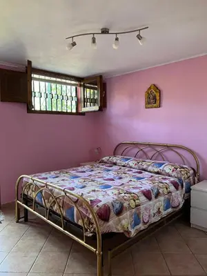 Letto o letti in una camera di La Casetta AB
