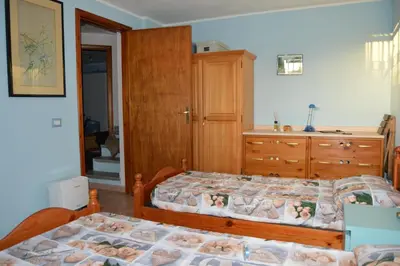 Letto o letti in una camera di La Casetta AB