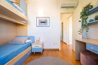 Letto o letti in una camera di Cagliari Bay View Villa