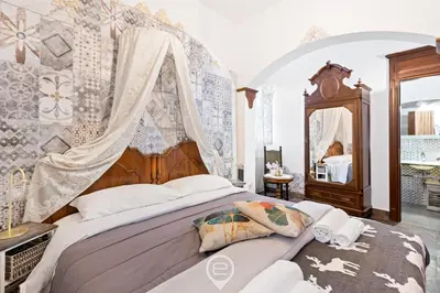 Letto o letti in una camera di Domo Antico Borgo