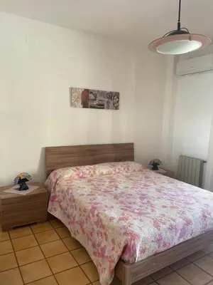 Letto o letti in una camera di La casa di ELEOBEA