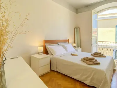 Letto o letti in una camera di La Piazzetta Apartment