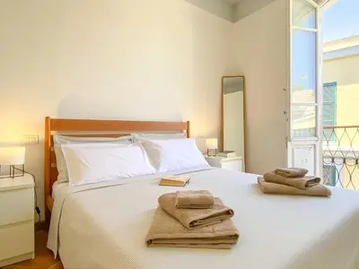 Letto o letti in una camera di La Piazzetta Apartment