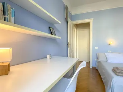 Letto o letti in una camera di La Piazzetta Apartment