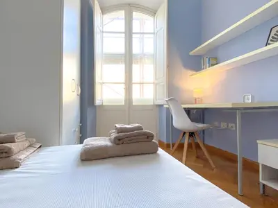 Letto o letti in una camera di La Piazzetta Apartment