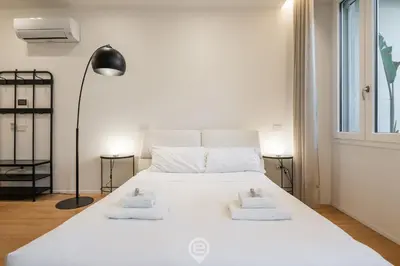 Letto o letti in una camera di Loft 4 Via Campidano