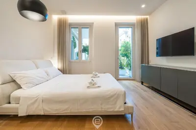 Letto o letti in una camera di Loft 4 Via Campidano