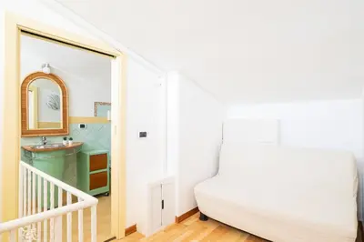Letto o letti in una camera di Cagliari, Poetto - Steps from the Beach & Wi-Fi