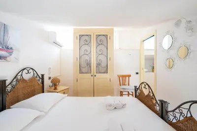 Letto o letti in una camera di Cagliari, Poetto - Steps from the Beach & Wi-Fi