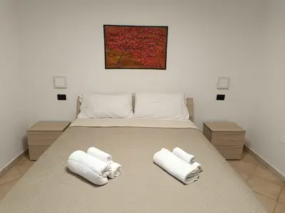 Letto o letti in una camera di Casa Sophie B&B