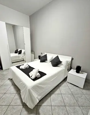 Letto o letti in una camera di NoveQuattro Apartment
