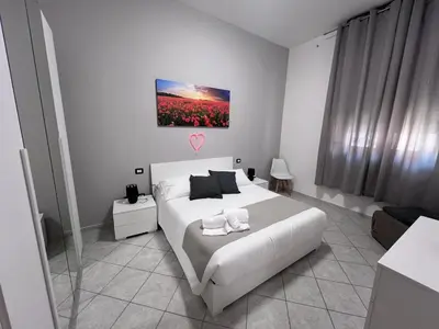 Letto o letti in una camera di NoveQuattro Apartment