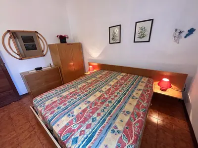 Letto o letti in una camera di Villa Aurora