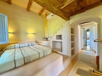 Letto o letti in una camera di Nature's Pool Apartments