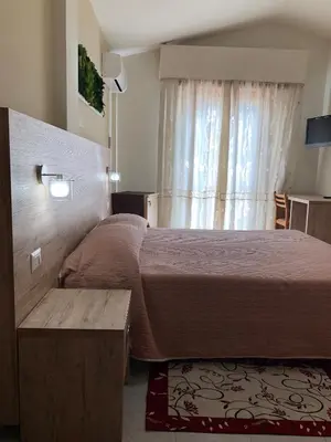 Letto o letti in una camera di Hotel Centrale