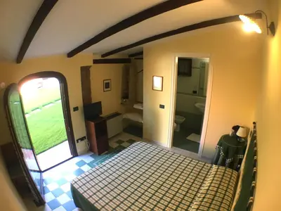Letto o letti in una camera di Corte Arrubia