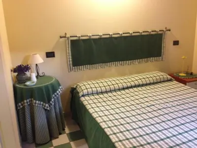 Letto o letti in una camera di Corte Arrubia