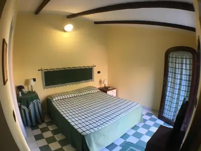 Letto o letti in una camera di Corte Arrubia