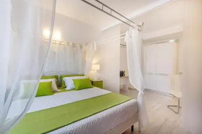 Letto o letti in una camera di Sette Colli Guesthouse