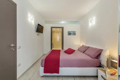 Letto o letti in una camera di Sette Colli Guesthouse