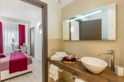 Letto o letti in una camera di Sette Colli Guesthouse