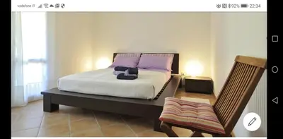 Letto o letti in una camera di Casa Alessandra
