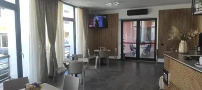 TV o dispositivi per l'intrattenimento presso Rooms FB Famiglia Bittu