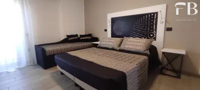 Letto o letti in una camera di Rooms FB Famiglia Bittu