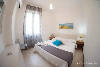 Letto o letti in una camera di Le Dimore del Sole LT