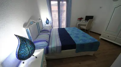 Letto o letti in una camera di Affittacamere Sa Mariola