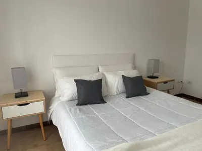 Letto o letti in una camera di Appartamenti ucuppu