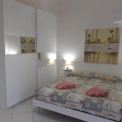 Letto o letti in una camera di Villa Gabriella