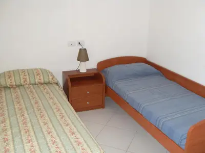 Letto o letti in una camera di Villa Gabriella