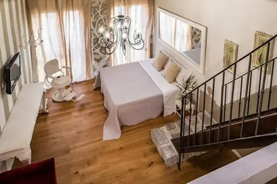 Letto o letti in una camera di Oisife Apartments