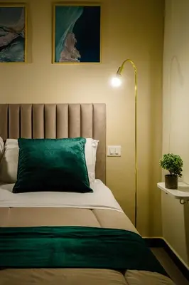 Letto o letti in una camera di Oisife Apartments