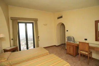 Letto o letti in una camera di Hotel Belvedere