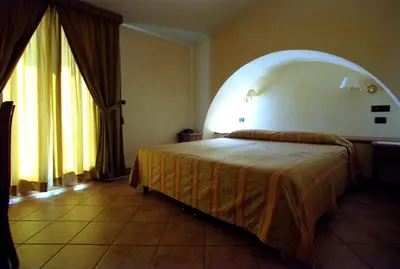 Letto o letti in una camera di Hotel Belvedere
