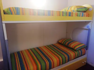 Letto o letti in una camera di Casa San Salvatore