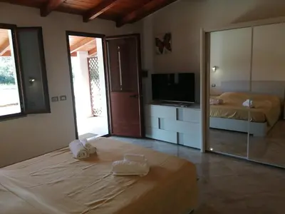 Letto o letti in una camera di Il Frutteto