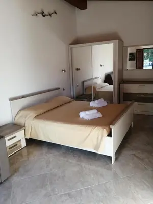 Letto o letti in una camera di Il Frutteto