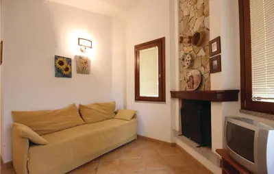Area soggiorno di Nice Home In Costa Rei Muravera-Ca-