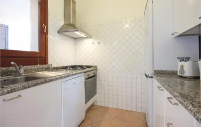 Cucina o angolo cottura di Beautiful Home In Costa Rei -Ca-
