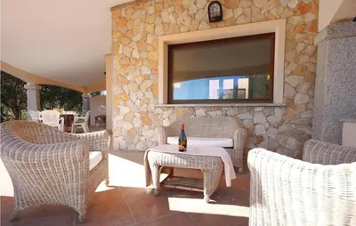 Area soggiorno di Stunning Home In Costa Rei -Ca-
